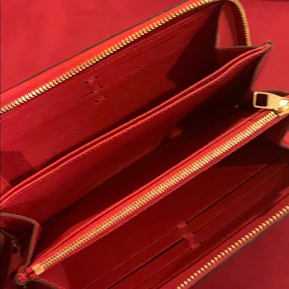 LV red leather Empreinte zippy wallet